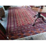 Decorative Persian or Afghan Bokahra rug {248 cm L x 156 cm W}.