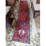 Decortative Afgan Karachey carpet runner {338 cm L x 58 cm W}.