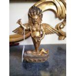 Gilded metal Indian winged Deity mounted on Lotus Flower bed. { 19cm H X 18cm W X 6cm D }.