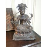 Gilded bronze figure of an Oriental Deity seated on a Lotus Flower { 28cm H X 18cm W X 14cm D }.