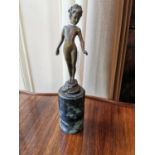 Bronze model of a Young Boy mounted on marble base {33 cm H x 8 cm W}.