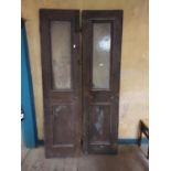 Pair of painted pine doors, the glazed panel above a blind panel { 227cm H X 58cm W }.