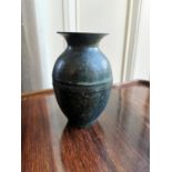 Bronze flower vase {15 cm H x 12 cm Dia.}.