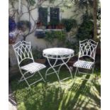 Decorative cast iron three piece garden - round table with two folding white chairs {Table 71 cm