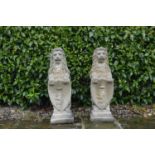 Pair moulded stone Lions with shields {85 cm H x 25 cm W}.