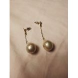 Pair of substantial baroque drop pearl earrings