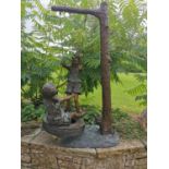 Exceptional quality bronze sculture of two girls on a swing {145 cm H x 87 cm W x 70 cm D}.