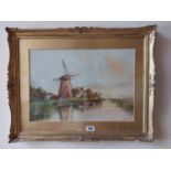 19th C. watercolour Dutch scene mounted in giltwood frame by L. Van. Staaten {62 cm H x 80 cm W}.