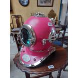 Chrome and metal diver's helmet { 44cm H X 34cm W X 39cm D }.