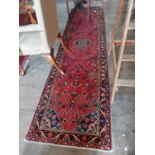 Decorative carpet runner {320 cm L x 84 cm W}.