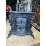 19th C. Decorative cast iron stove