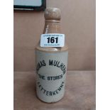 Thomas Mulhern The Stores Letterkenny stoneware Ginger beer bottle. {19 cm H x 7 cm Dia}.