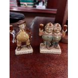 Two Guinness ceramic advertising figures {8 cm H}.