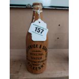 E Smithwick and Sons Kilkenny stoneware Ginger beer bottle. { 20 cm H x 7 cm Dia}.
