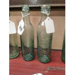 Two 19th C. glass bottles - O'Donovan's Carryowen and Murphy and Bradshaw Limerick. { 22 cm H x 6