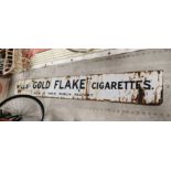 Wills's Gold Flake Cigarettes enamel advertising sign. {33 cm H x 268 cm W}.