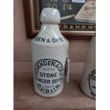 Hovenden and Orr Dublin stoneware Ginger beer bottle. { 17 cm H x 7 cm Dia}.