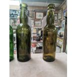 Two 19th C. green glass bottles - Quinn and Collins Ennis and Downes and Sons Ennis . {22 cm H x 6