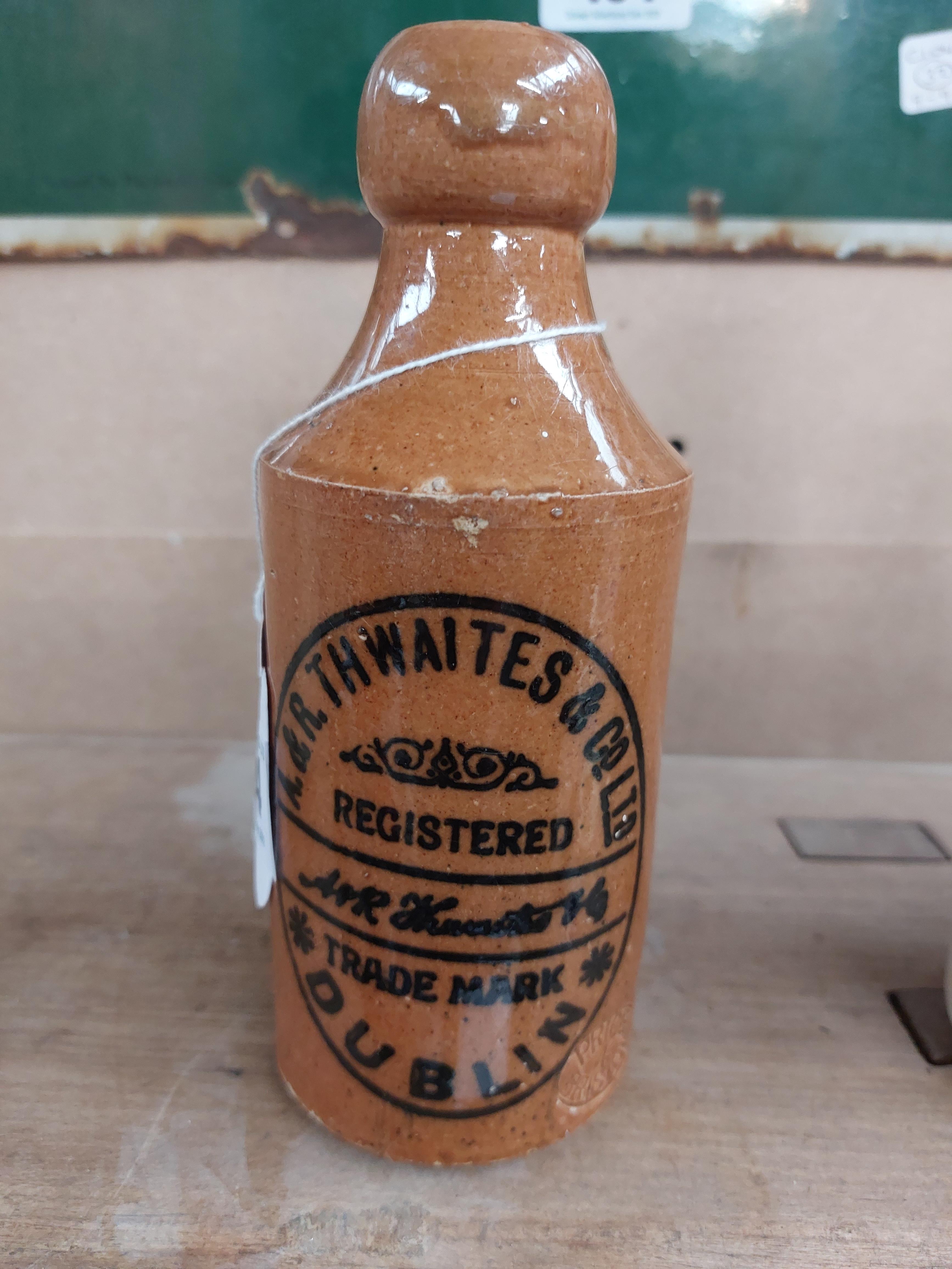 A R Thwaites Dublin stoneware Ginger beer bottle. {17 cm H x 7 cm Dia}.
