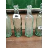 Two early 20th C. glass blob top bottles -John Egan Dublin and J and M Kernan. { 23 cm H x 6 cm