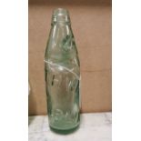 19th C. glass Codd bottle - Thwaites Dublin. { 22 cm H x 6 cm Dia}.