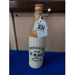 Downes and Sons Ennis stoneware Ginger beer bottle. { 20 cm H x 7 cm Dia}.