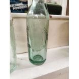Two 19th C. glass bottles - Murphy and Bradshaw Limerick and C J Hassett Limerick {22 cm H x 6 cm