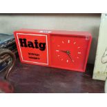 1950's Haig Whisky advertising clock. {16 cm H x 31 cm W x 6 cm D}.