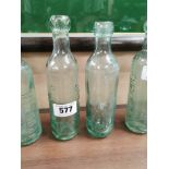 Two early 20th C. glass blob top bottles - M Sullivan Waterford and J Carvey Waterford {22 cm H x