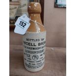 Nicell Bros The Rosemount House Londonderry stoneware Ginger beer bottle. {20 cm H x 7 cm Dia}