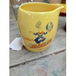 Ogden's Juggler Tobacco advertising jug. 8 pence per ounce. {11 cm H x 10 cm W x 9 cm D}.