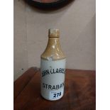John Clarke and Co Strabane stoneware Ginger beer bottle. { 20 cm H x 7 cm Dia}.