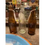 Three 19th C. glass mineral bottles -Two JJ O'Byrne Limerick and Geo H Lett Enniscorthy. {19 cm H