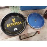 Two Guinness tinplate advertising trays. { 33 dia} and {27 cm Dia}.