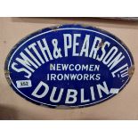 Smith and Pearson Ltd Newcomen Ironworks Dublin oval enamel advertising sign. {46 cm W}.