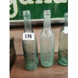 Two early 20th C. glass Codd bottles -C J Hassett Ennis. { 23 cm H x 6 cm Dia}.