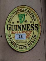 Guinness Extra Stout cast iron wall sign. {19 cm H x 15 cm W}.