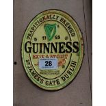 Guinness Extra Stout cast iron wall sign. {19 cm H x 15 cm W}.