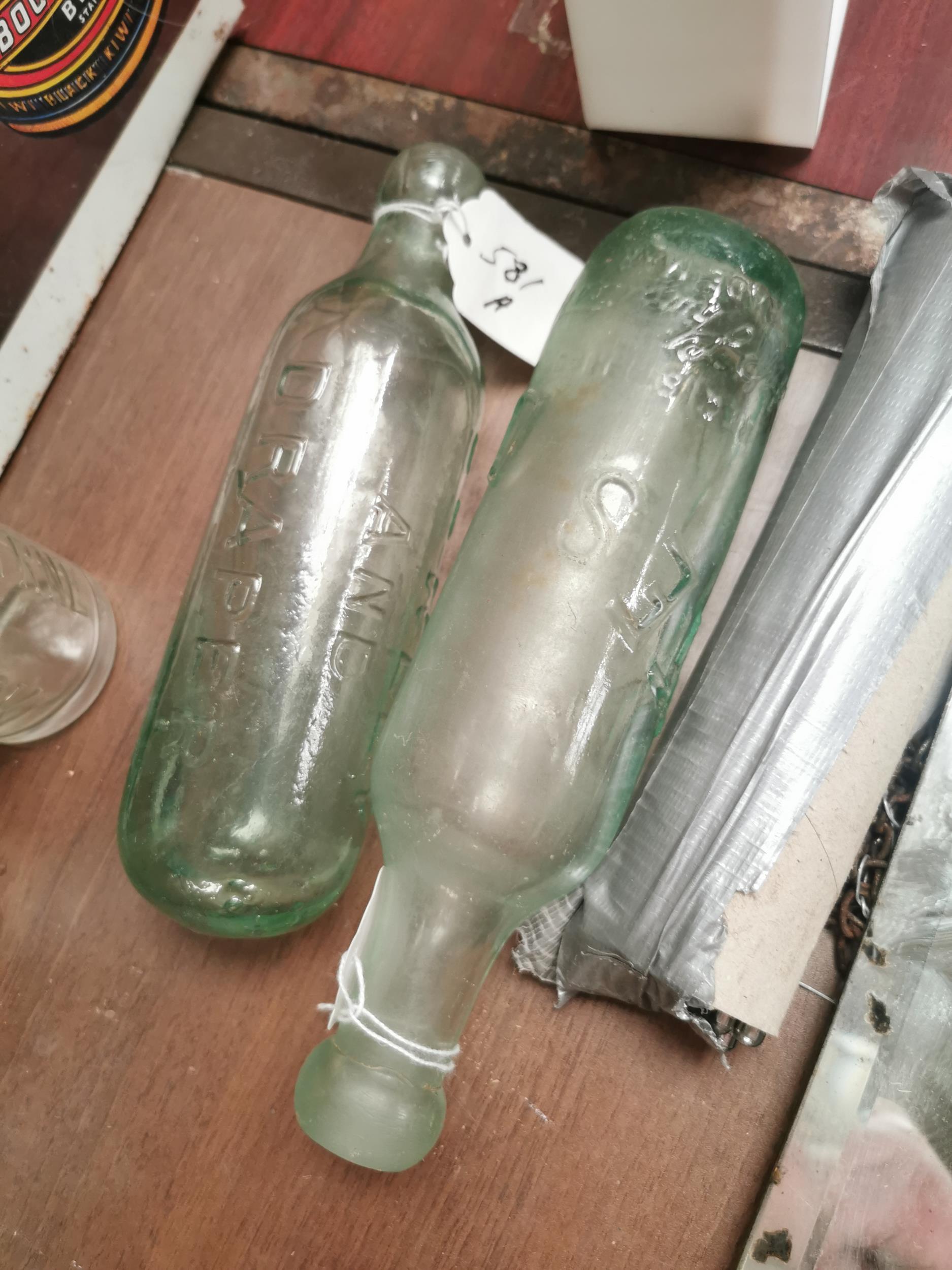 Two early 20th C. glass blob top bottles - Bewley and Draper and Thwaites Dublin. {22 cm H x 6 Dia}
