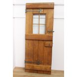Oak panelled door with glass panels and metal mounts { 198cm H X 76cm W X x 6cm D }.