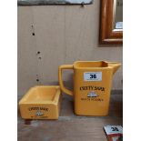 Cutty Sark Scotch Whiskey water jug and ashtray. Jug {18 cm x 18 cm W x 8 cm D} and Ashtray 6 cm H x