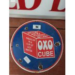 OXO cube circular enamel advertising sign. {30 cm Dia}.