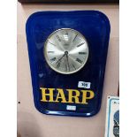 Perspex Harp Lager clock {40 cm H x 27 cm W}.