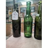 Two 19th C. green glass bottles - Downes and Sons Ennis and Twomey's Limerick . {23 cm H x 6 cm