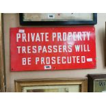 Private Property Trespassers Will Be Prosecuted enamel sign {31 cm H x 61 cm W}.