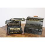 The Smith Premier Typewriter No 4 with lid { 29cm H X 35cm W X 40cm D }.