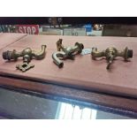 Three brass barrel taps. {14 cm H x 12 cm W}.