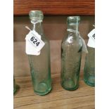 Two 19th C. glass bottles - Thomas Jennings Cork and John Daly and Co Cork. { 23 cm H x 6 cm Dia}