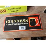 Guinness Guinness More Than Goodness celluloid advertising showcard {13 cm H x 28 cm W}