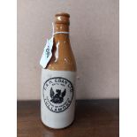 P and H Egan Tullamore stoneware Ginger beer bottle. { 20 cm H x 7 cm Dia}.